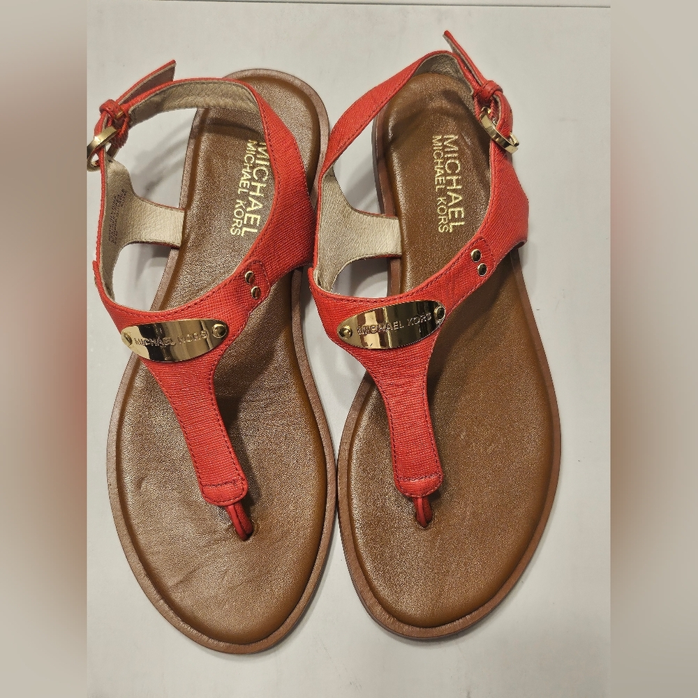 Michael Kors women’s MK Plate Flat Thong Sandals. New